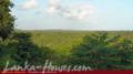 Land in mountain with ocean view