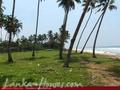 Beach land with old house