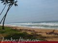 Beach land with old house