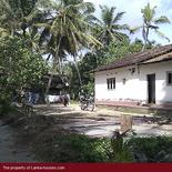 Beach land with old house.